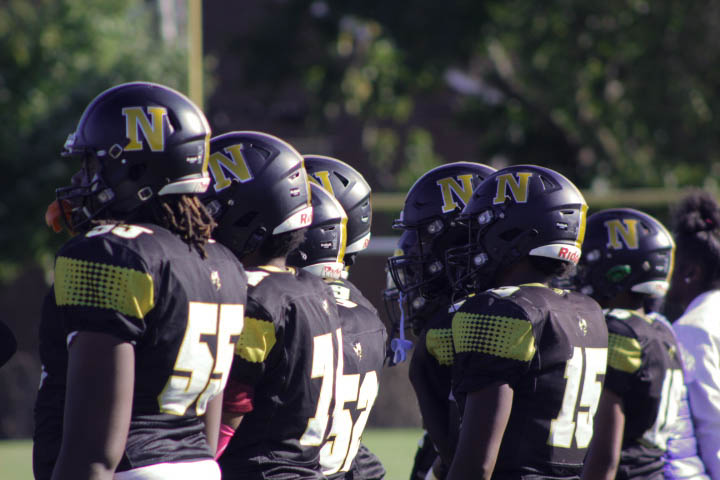 The Newark High School football game stands together during a difficult game against Howard High School of Tech on Thursday 10/10.